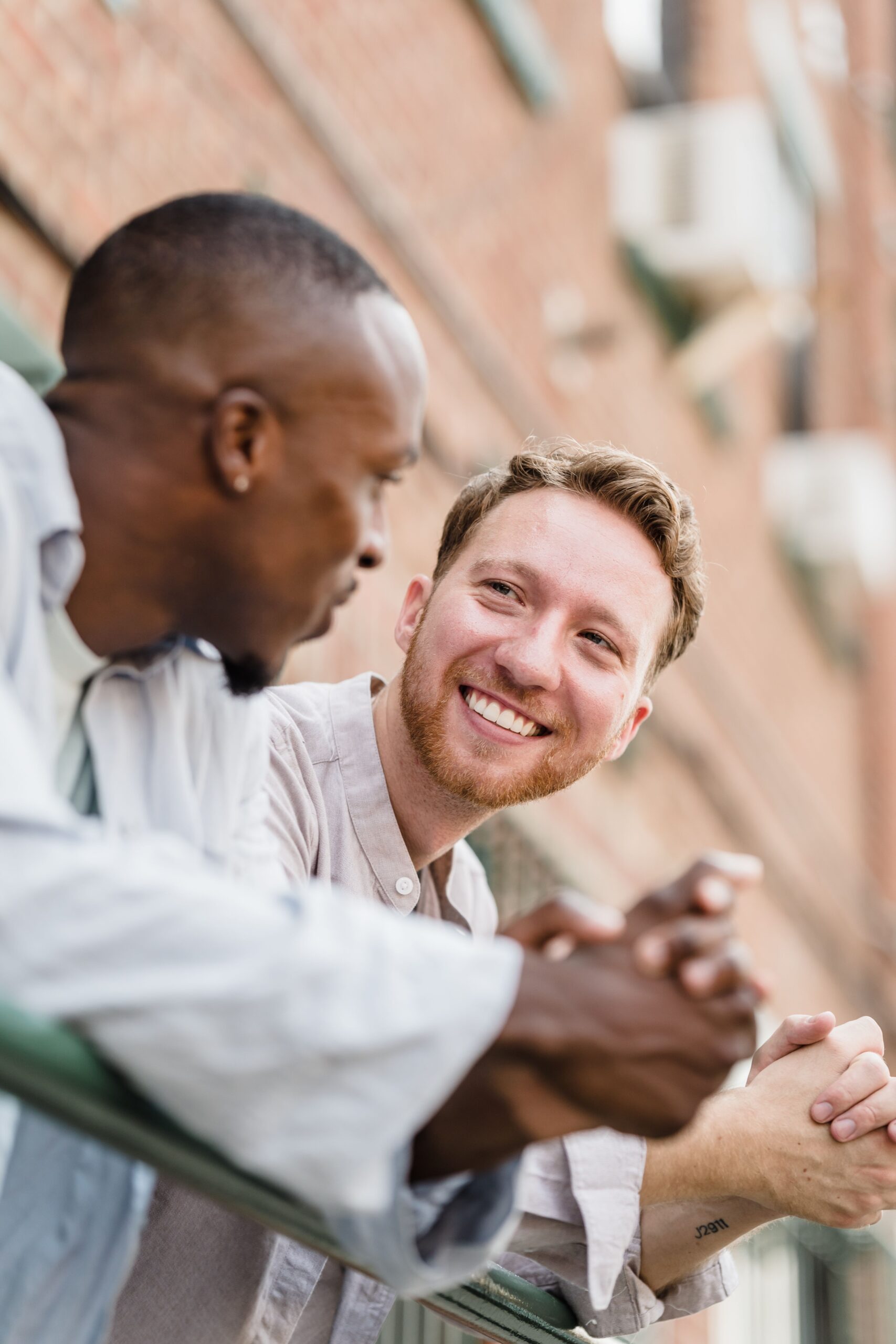 Two friends talking and listening to each other