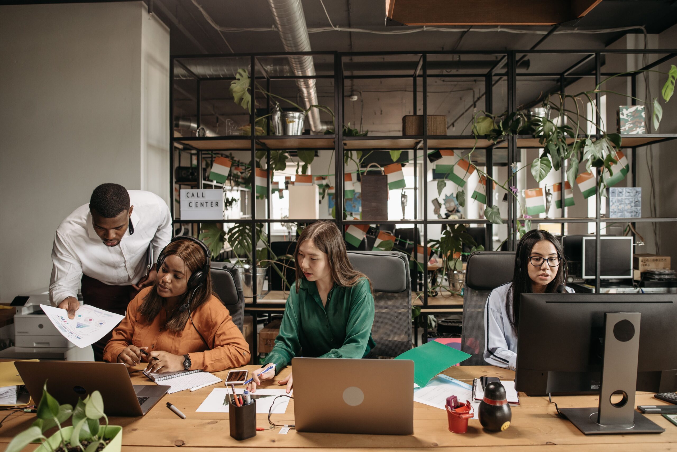 Coworkers collaborating and communicating in an office